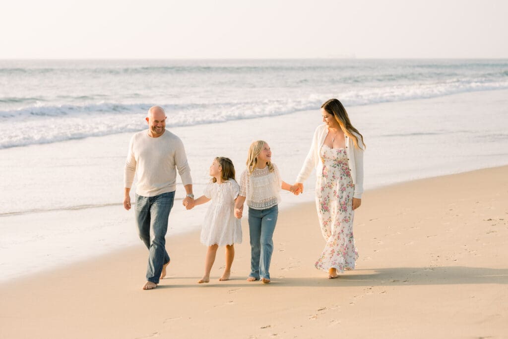 An example of what to wear for family beach photos.  This family is in neutrals and jeans, looking great!