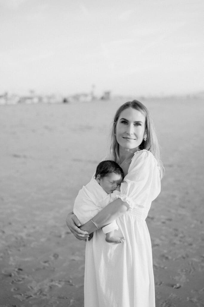 Mom and baby taking baby beach photos in Hermosa Beach.