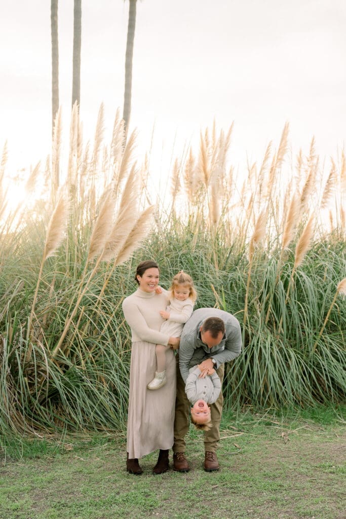 A sweet family taking family photos at the Palos Verdes cliffs.