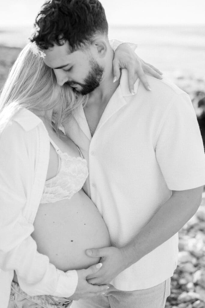A Los Angeles maternity session with a young couple embracing.
