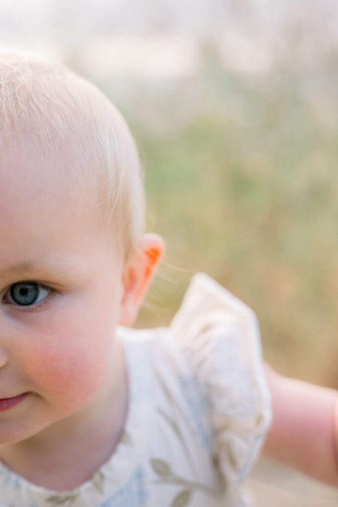 A close up of a little girl's face taken during her spring family portrait session in Los Angeles.