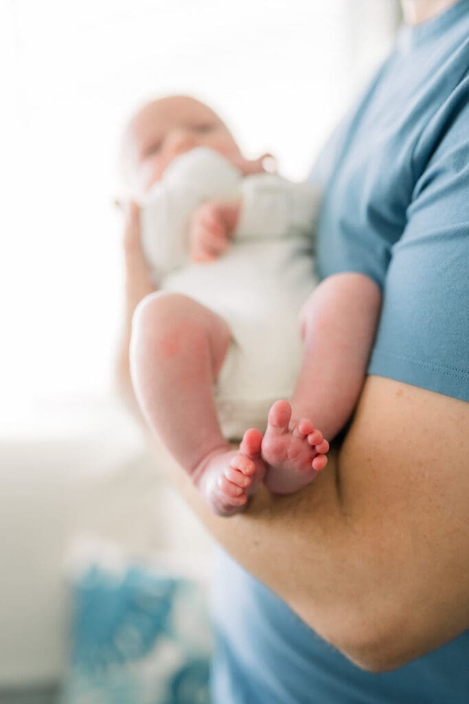 A close up of a newborn baby's feet.