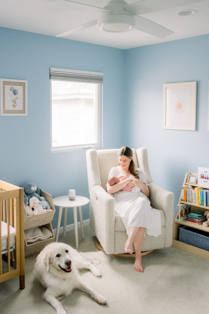 A South Bay family doing newborn photos at home with their dog.