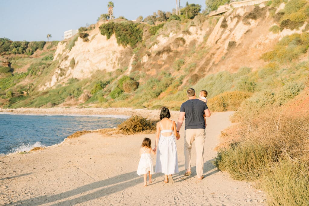 A perfect example of one of the best South Bay family photo locations features a beautiful walking path to the beach at RAT beach.